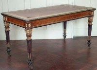 Lot 668 - Writing desk with gesso mounts.