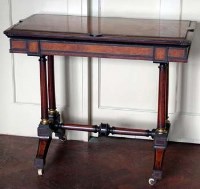 Lot 676 - Victorian fold-over card table