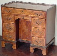 Lot 695 - Marquetry kneehole desk