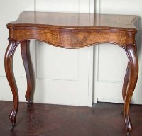 Lot 703 - Walnut fold over card table