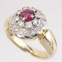 Lot 433 - 18ct ruby and diamond ring
