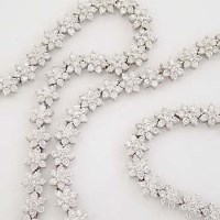 Lot 454 - 18ct white gold diamond necklace