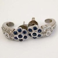 Lot 484 - 18ct white gold sapphire and diamond earrings