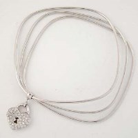 Lot 516 - Square white gold diamond bangle