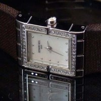Lot 536 - Raymond Weil steel and diamond lady's watch (with