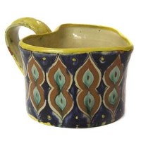 Lot 786 - Della Robbia heart shaped cup
