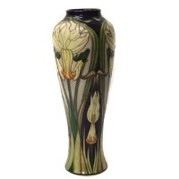 Lot 817 - Moorcroft March Gold vase.