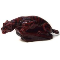 Lot 820 - Royal Doulton flambe tiger on a rock