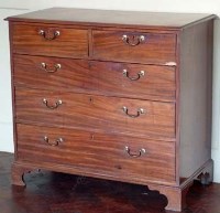 Lot 847 - George III mahogany chest of drawers