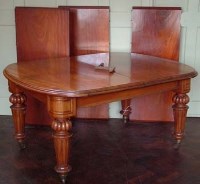 Lot 861 - Victorian wind - out Mahogany table with three leaves
