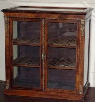 Lot 869 - Figured walnut dwarf vitrine, circa 1890, the