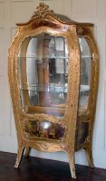 Lot 903 - Bombe display Cabinet