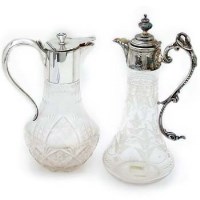 Lot 308 - Two plated mounts claret jugs
