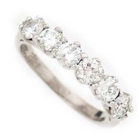 Lot 384 - Six stone half hoop diamond ring