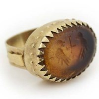 Lot 440 - Yellow metal seal ring