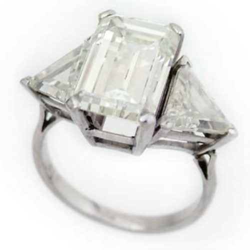Lot 464 - Emerald cut diamond ring with triangular shoulders
