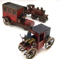 Lot 531 - One tinplate horseless carriage and two other toys