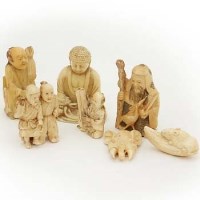 Lot 550 - Six ivory ornaments and another