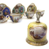 Lot 588 - Three Dresden cabinet cups and saucers and bell