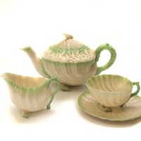 Lot 592 - Belleek shell moulded teaset