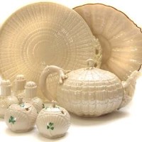 Lot 594 - Belleek teapot two cake plates and five cruets
