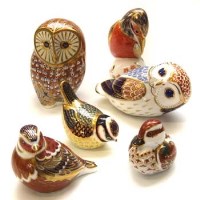 Lot 608 - Collection of Crown Derby bird paperweights