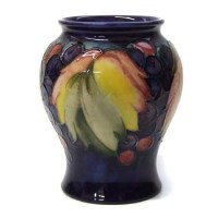 Lot 651 - Moorcroft leaf and berry vase