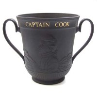 Lot 673 - Royal Doulton Captain Cook loving mug