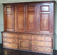 Lot 701 - Oak and cross banded housekeepers cupboard