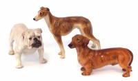 Lot 183 - Royal Doulton Greyhound, Dachschund and Bull Dog