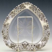 Lot 269 - Silver rimmed heart-shaped glass dish