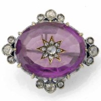Lot 279 - Amethyst and diamond brooch.