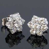 Lot 296 - White gold and diamond cluster earrings