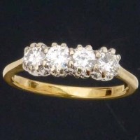 Lot 302 - Four-stone diamond ring