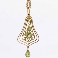 Lot 308 - Peridot and pearl pendant on chain
