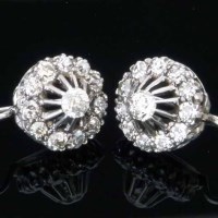 Lot 323 - Platinum and diamond earrings