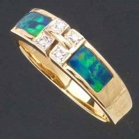 Lot 324 - Modern design opal and diamond ring