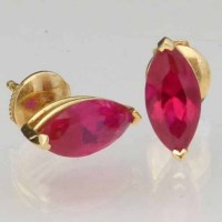 Lot 334 - Ruby earrings in gold mounts