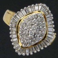 Lot 338 - Baguette and brilliant oval diamond cluster ring