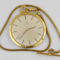Lot 347 - Omega 750 gold pocket watch on 9ct chain.