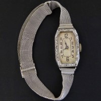 Lot 349 - 9ct white gold cocktail bracelet watch.