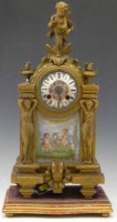 Lot 565 - French Ormolu and porcelain panel mantel clock