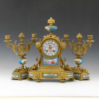 Lot 570 - French clock garniture with gilt mounts
