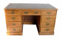 Lot 641 - Victorian pine kneehole desk with inset leather