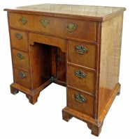 Lot 650 - George II walnut knee-hole desk.