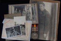 Lot 58 - Queen's South Africa Medal with four clasps and other related photographs.