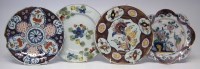 Lot 130 - Four Delft plates, painted with polychrome floral