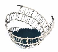 Lot 284 - Lesley Risby porcelain bowl in slip covered wire