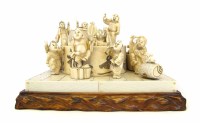 Lot 318 - A Japanese ivory figure group
