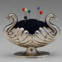 Lot 332 - Silver swan pin cushion